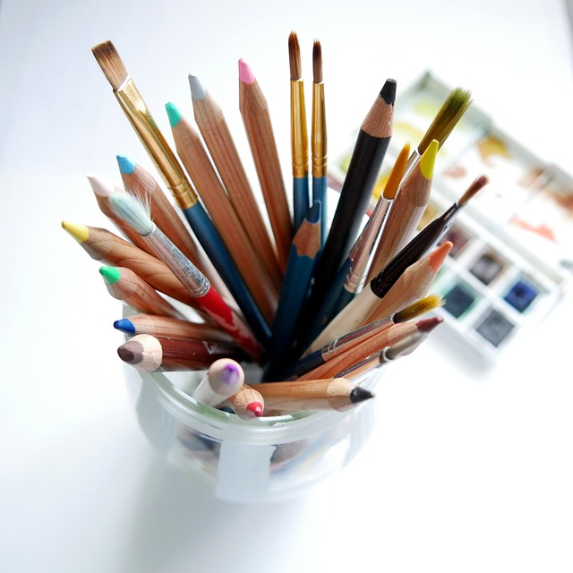 artist drawing pencil sketchbook studio